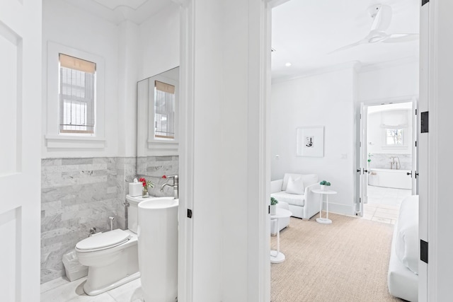 45 N Charles St, Inlet Beach, FL 32461 - full bath with tile walls, toilet, a freestanding bath, wainscoting, and ceiling fan
