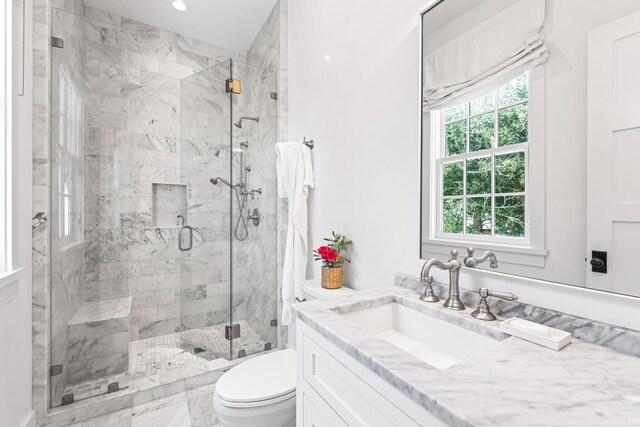45 N Charles St, Inlet Beach, FL 32461 - bathroom with toilet, a shower stall, vanity, and recessed lighting