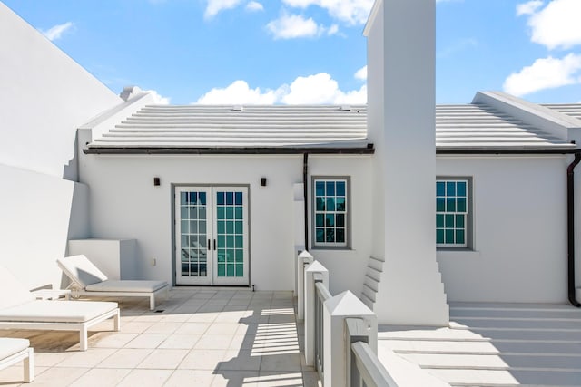 45 N Charles St, Inlet Beach, FL 32461 - back of property with french doors, stucco siding, and a patio