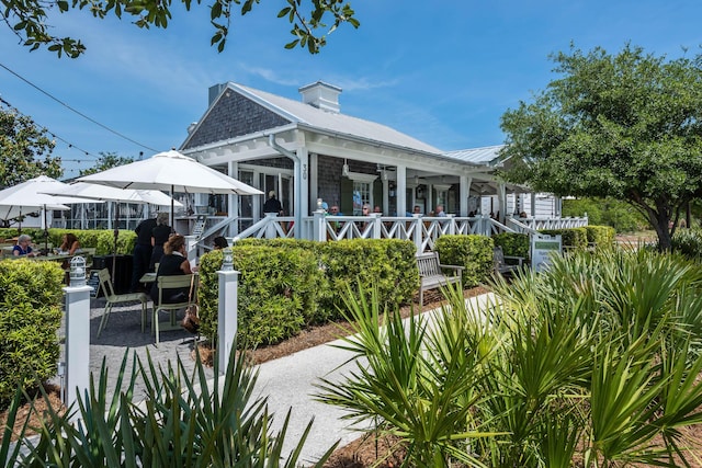 45 N Charles St, Inlet Beach, FL 32461 - rear view of house featuring a ceiling fan