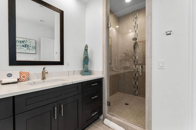 bathroom featuring vanity and walk in shower