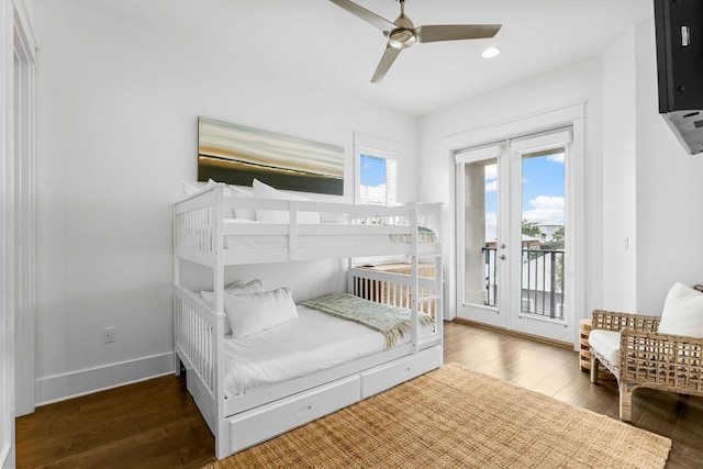 bedroom featuring access to exterior, ceiling fan, and dark hardwood / wood-style floors