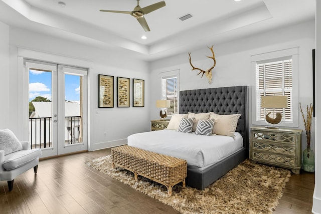 bedroom featuring hardwood / wood-style floors, ceiling fan, access to outside, and french doors