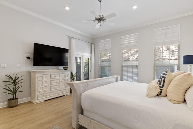 bedroom with ceiling fan, ornamental molding, and light hardwood / wood-style floors