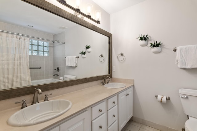 full bathroom with toilet, tile patterned flooring, shower / bathtub combination with curtain, and vanity