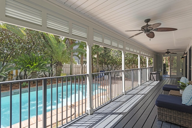 exterior space with ceiling fan