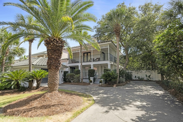 view of front of house with a balcony and a porch