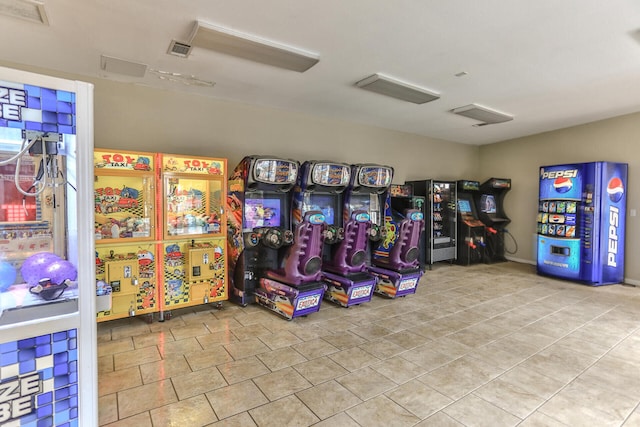 rec room featuring light tile patterned flooring