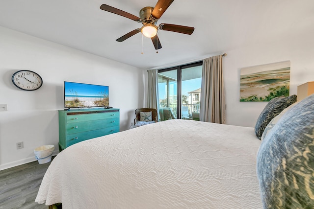 bedroom featuring ceiling fan, hardwood / wood-style flooring, and access to exterior