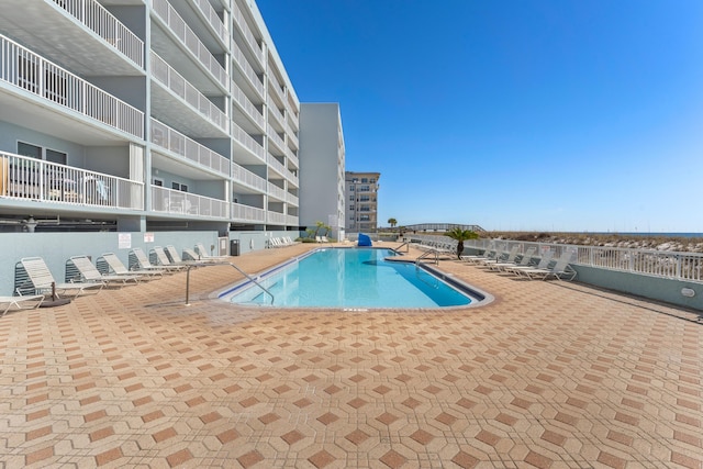 view of pool featuring a patio area