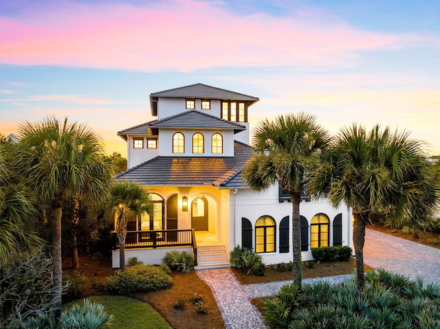 48 Paradise By The Sea Blvd, Inlet Beach, FL 32461 - view of front of home with a porch and stucco siding