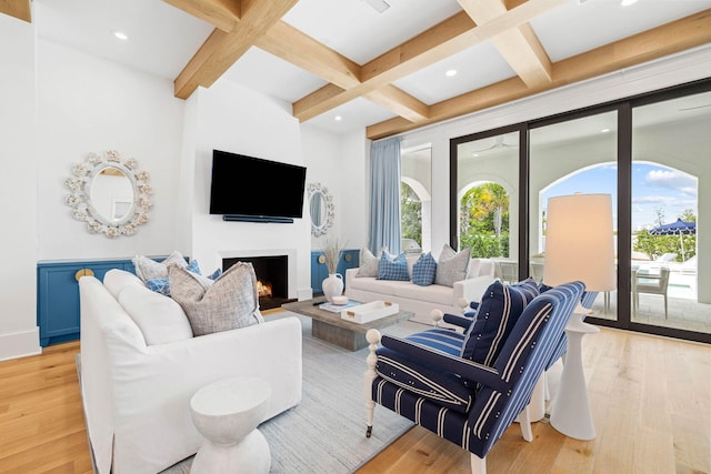 48 Paradise By The Sea Blvd, Inlet Beach, FL 32461 - living room featuring coffered ceiling, beam ceiling, recessed lighting, light wood-type flooring, and a warm lit fireplace