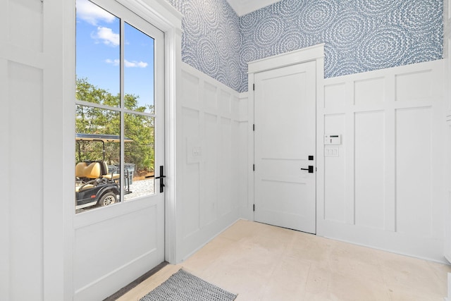 48 Paradise By The Sea Blvd, Inlet Beach, FL 32461 - entryway with wallpapered walls and a decorative wall