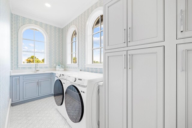 48 Paradise By The Sea Blvd, Inlet Beach, FL 32461 - laundry room with wallpapered walls, washing machine and dryer, cabinet space, and light tile patterned floors