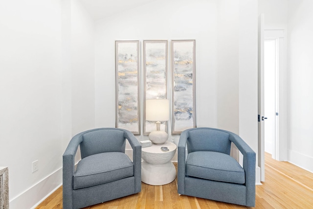 48 Paradise By The Sea Blvd, Inlet Beach, FL 32461 - sitting room with wood finished floors, vaulted ceiling, and baseboards