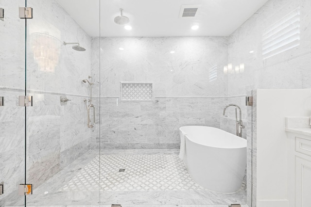 48 Paradise By The Sea Blvd, Inlet Beach, FL 32461 - full bath with a freestanding bath, a marble finish shower, and tile walls
