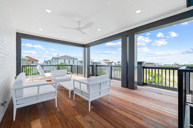 interior space with ceiling fan and wooden ceiling