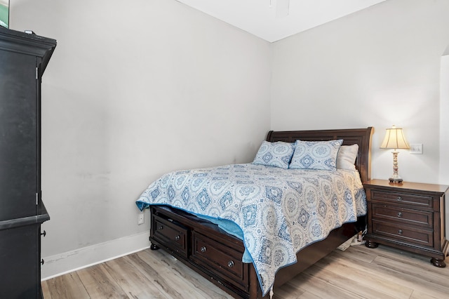 bedroom with light hardwood / wood-style flooring