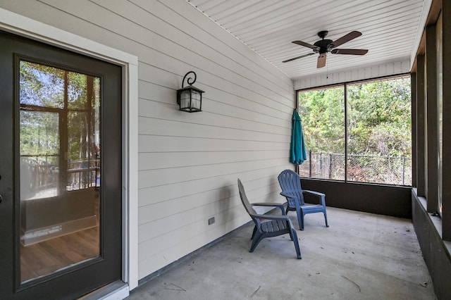 182 Pisces Dr, Santa Rosa Beach, FL 32459 - sunroom featuring a ceiling fan