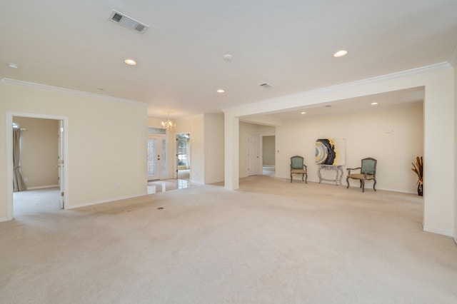 interior space with crown molding and a chandelier