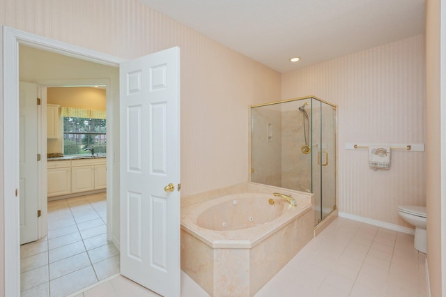 full bathroom featuring tile patterned flooring, vanity, toilet, and independent shower and bath