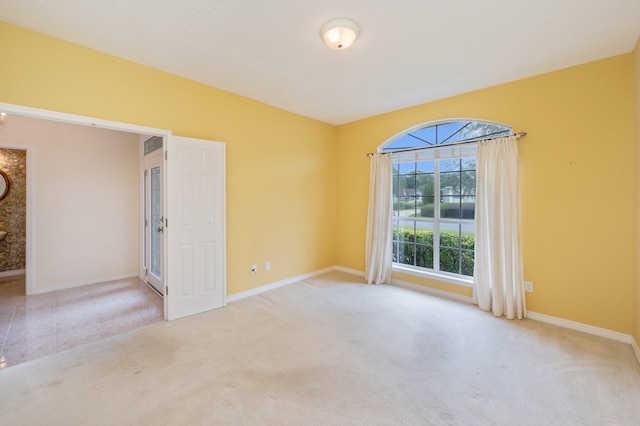 view of carpeted spare room