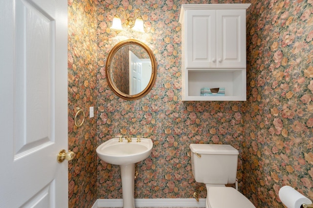 bathroom featuring toilet