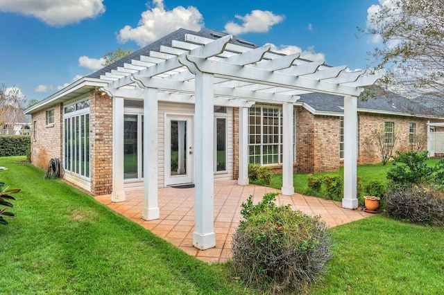 exterior space with a pergola, a patio area, and a yard