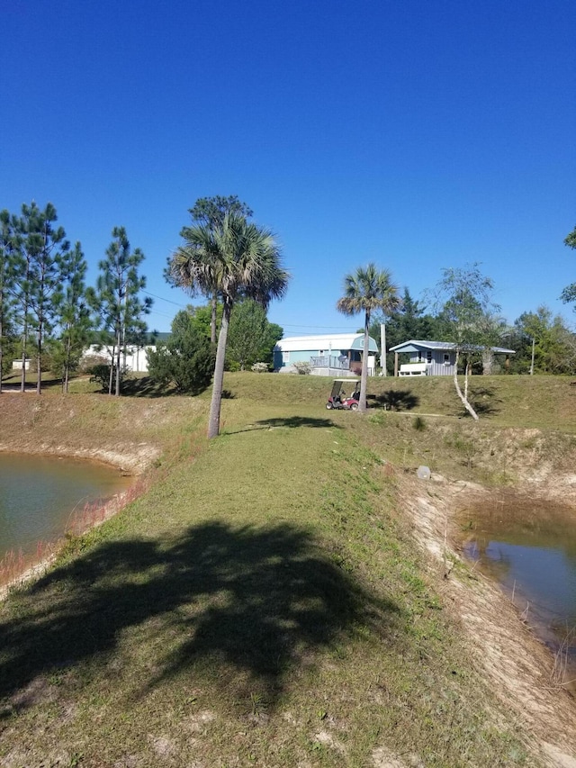 view of yard with a water view