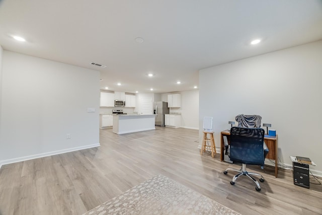 office featuring light hardwood / wood-style flooring