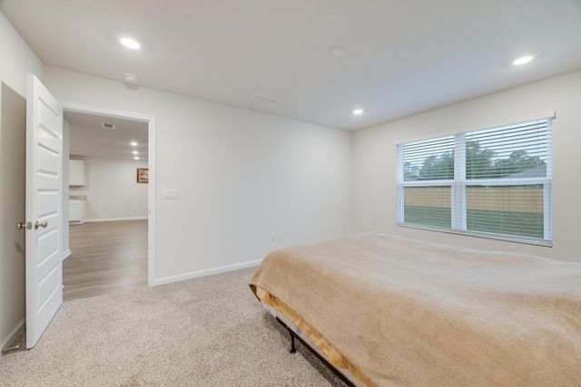 bedroom featuring wood-type flooring