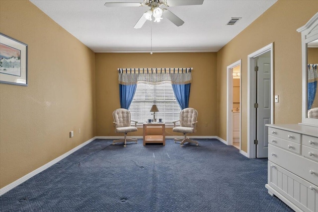 unfurnished room featuring ceiling fan and carpet floors