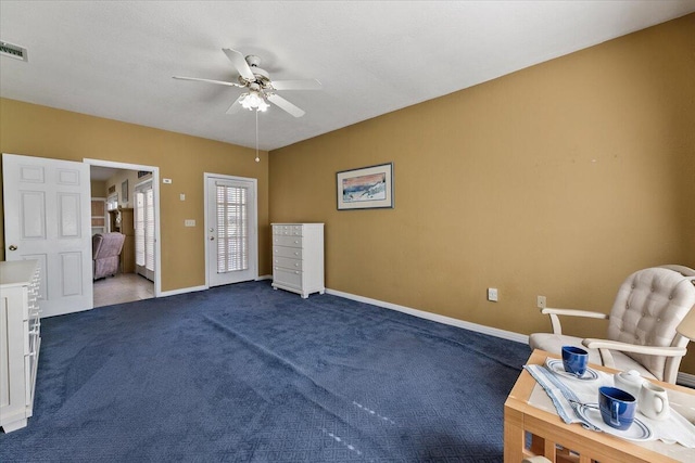 unfurnished room with carpet flooring and ceiling fan