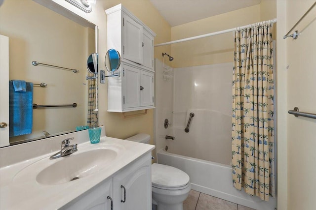 full bathroom with vanity, shower / bath combo with shower curtain, tile patterned floors, and toilet