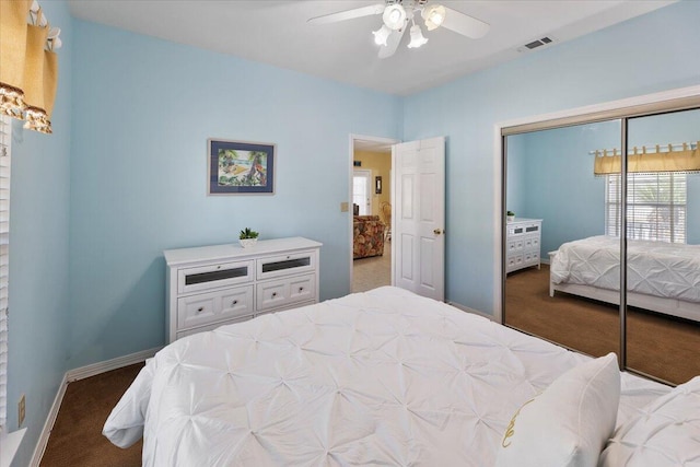 bedroom featuring ceiling fan, carpet flooring, and a closet