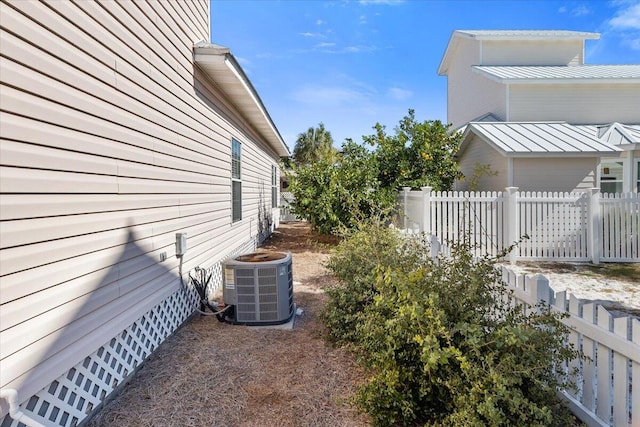 view of home's exterior featuring central air condition unit