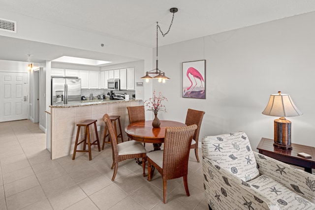 view of tiled dining room