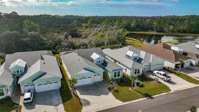 bird's eye view with a water view