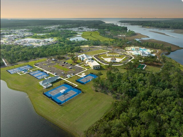 aerial view at dusk with a water view