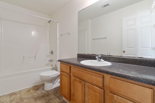 full bathroom featuring vanity, toilet, and tub / shower combination