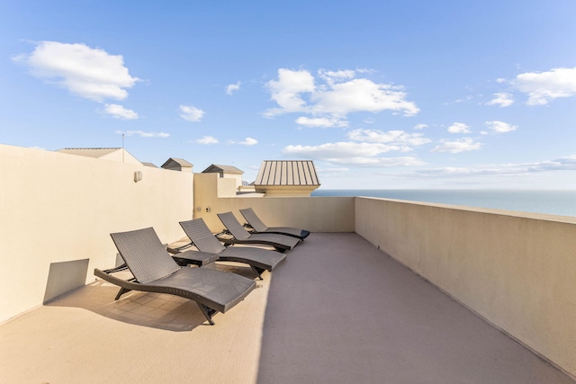 view of patio featuring a water view