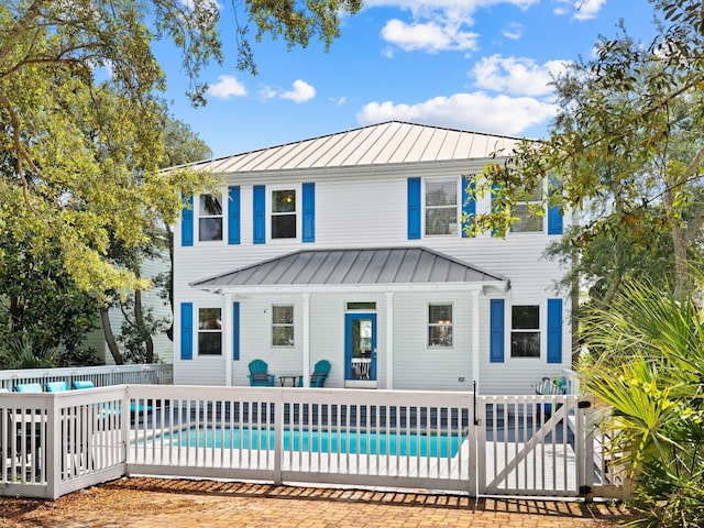 rear view of property with a patio area