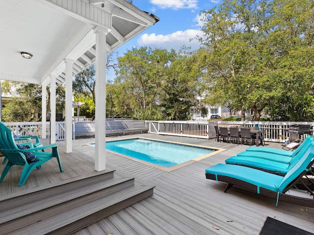 view of pool with a deck