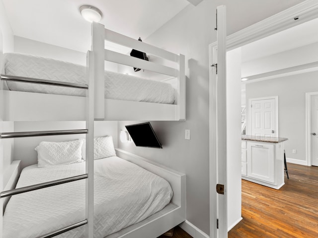 bedroom featuring hardwood / wood-style flooring