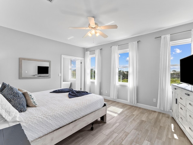 bedroom featuring ceiling fan and light hardwood / wood-style floors