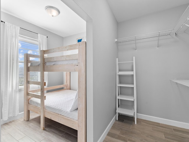 unfurnished bedroom with wood-type flooring