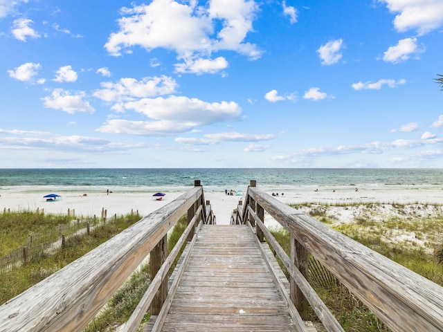 property view of water featuring a beach view