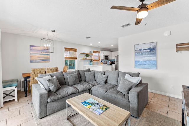 11 Beachside Dr Unit 1121, Santa Rosa Beach, FL 32459 - living area featuring light tile patterned floors, a chandelier, ceiling fan, a textured ceiling, and recessed lighting