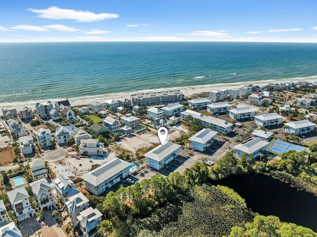 aerial view with a view of the beach and a water view