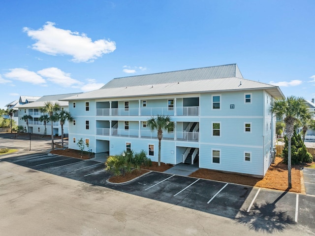 11 Beachside Dr Unit 1121, Santa Rosa Beach, FL 32459 - view of property featuring uncovered parking